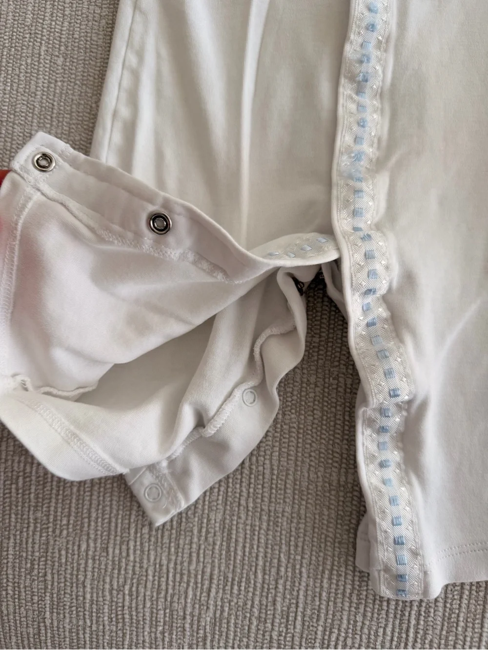 White Footless Baby Onsie with Blue Trim